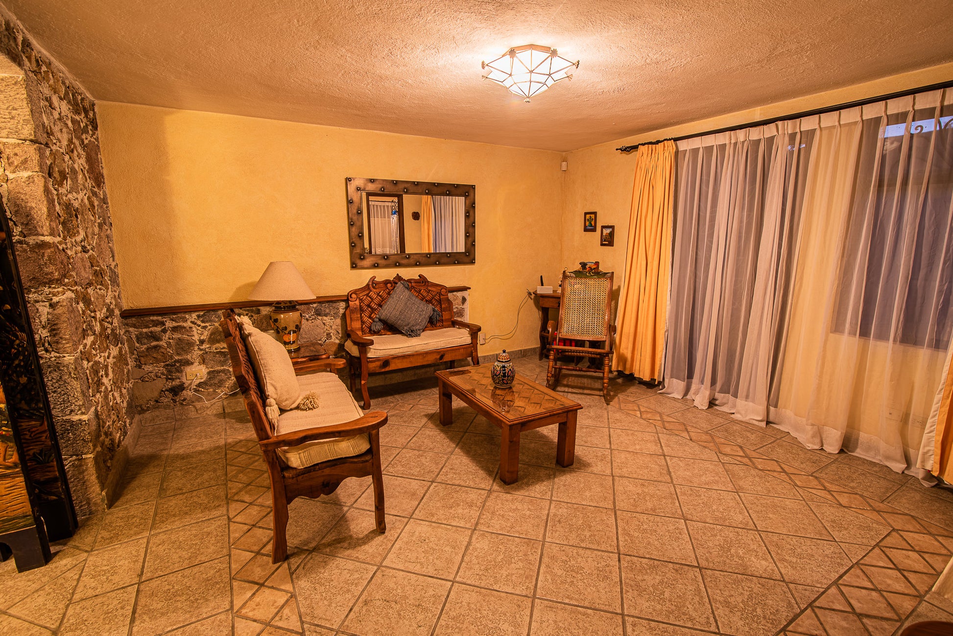 Living room with exit to own private outdoor terrace.