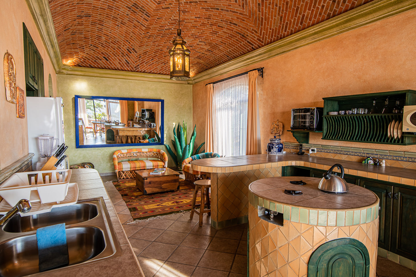 living room seen from the kitchen stove island