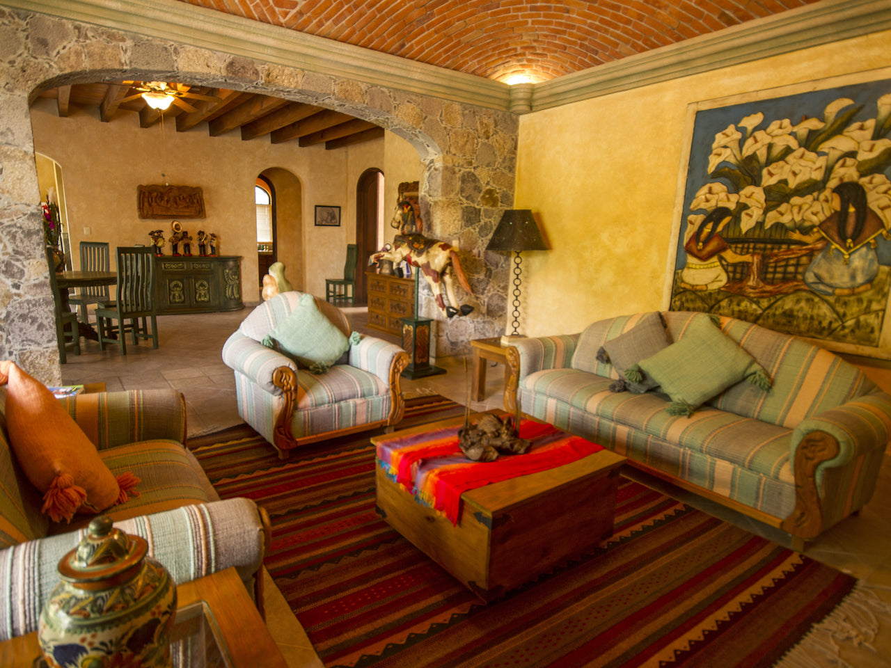 La Casa del Huizache spacious living area. Beyond, the dining area and the rooms. Welcomes 4 persons in 2 suites